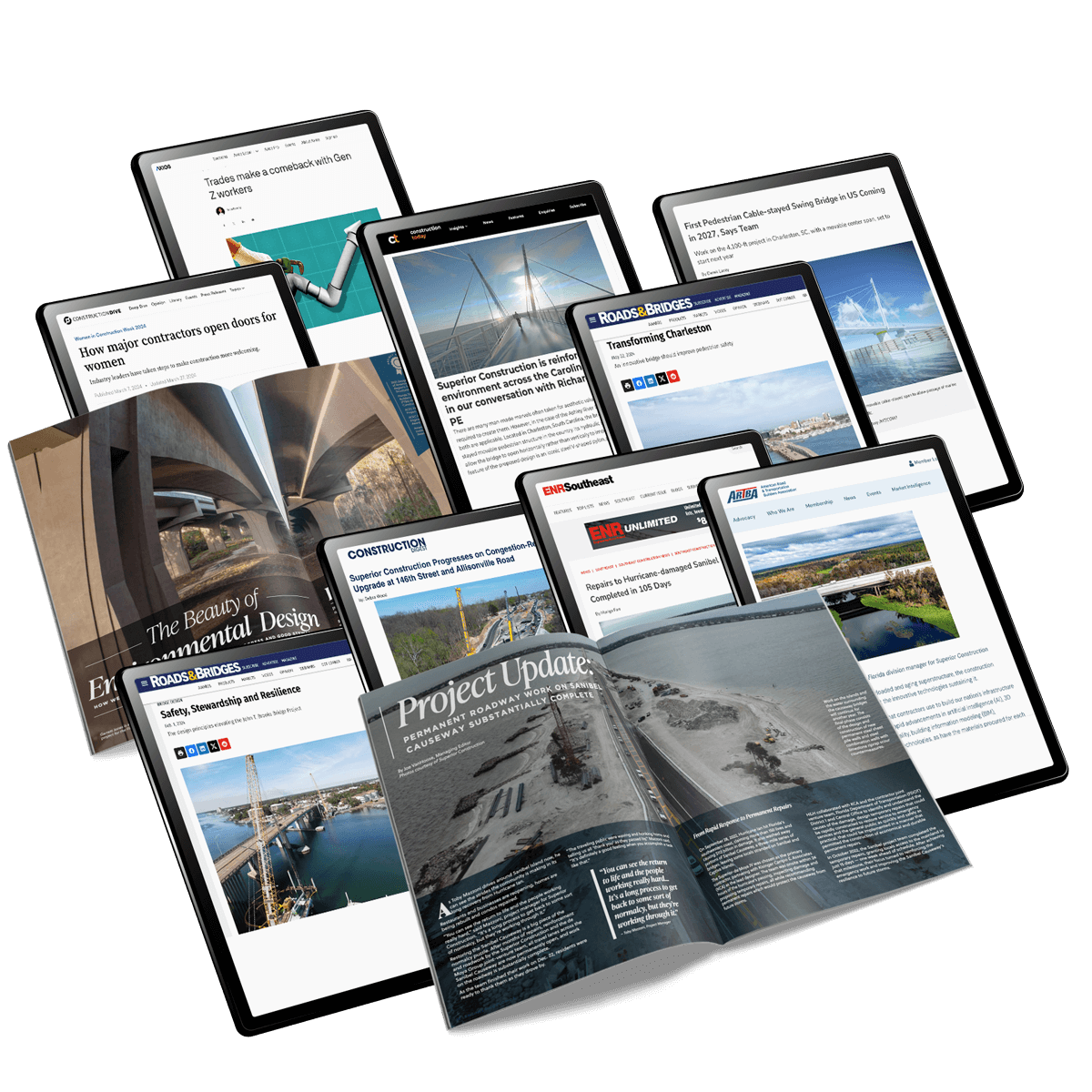 Magazines and iPads demonstrating press coverage in a variety of publications