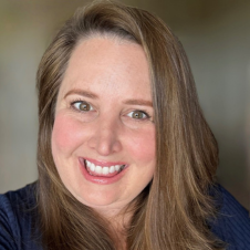 Brittany Lewis eadshot on a blurred background