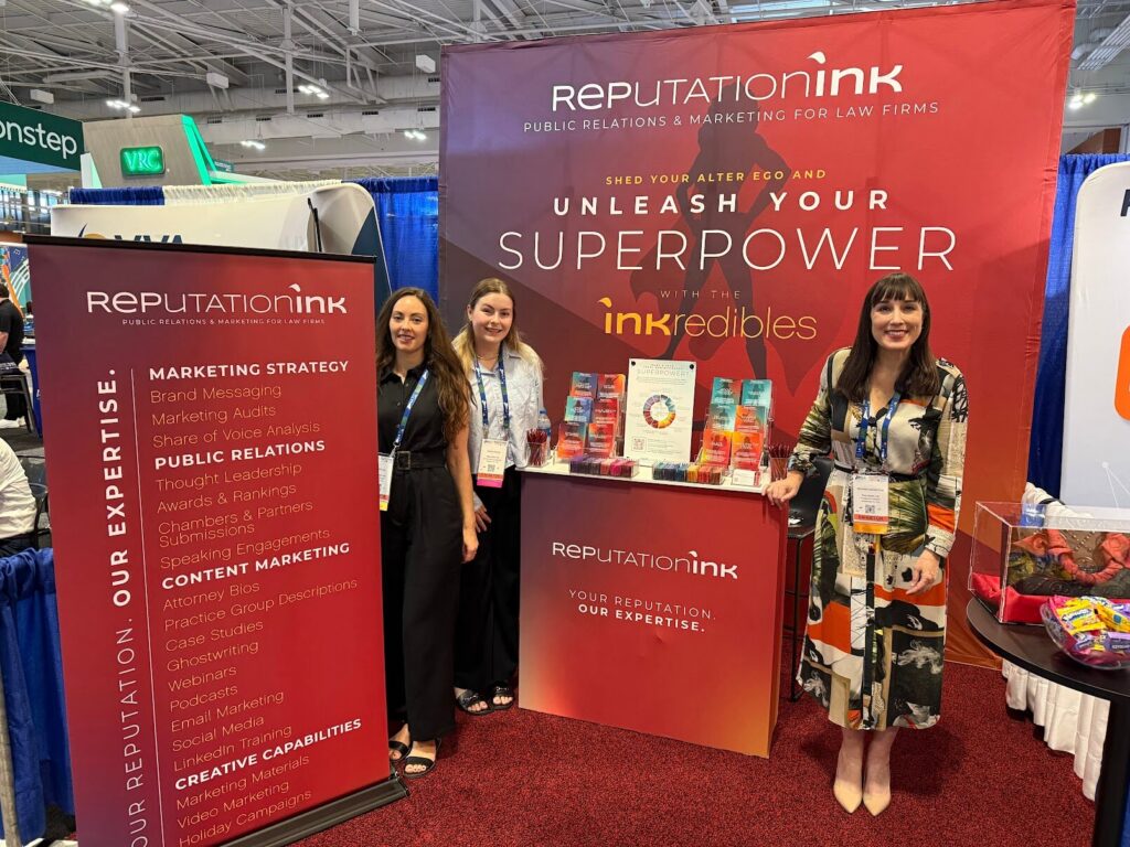 Reputation Ink "INKredibles" superhero themed trade show booth at the ALA conference in 2025