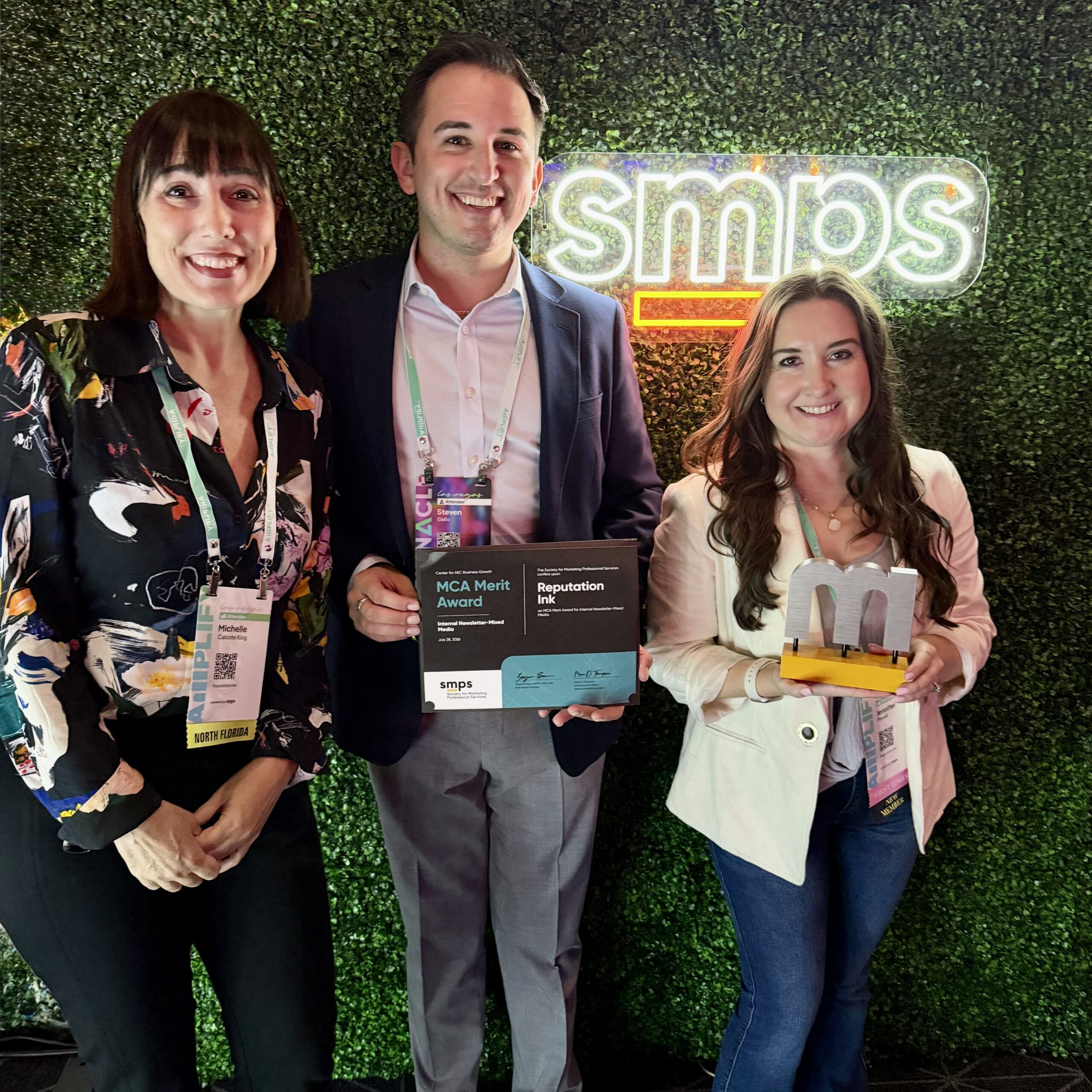 Michelle King, Steven Gallo and Jennifer Powell receiving SMPS award