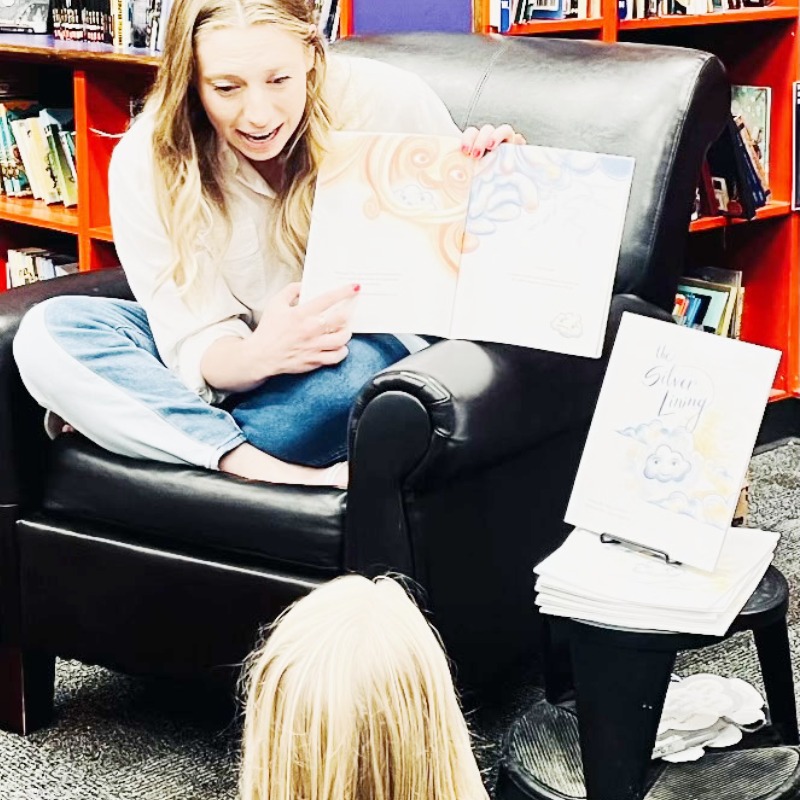 Megan Carthel reading to child